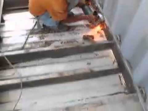 Creating a hole in the floor of a Shipping Container.mov