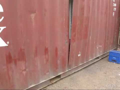 Cutting The Steel Door of a shipping container
